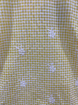 Yellow loop embroidered top
