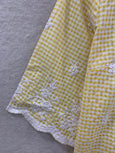 Yellow loop embroidered top