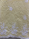 Yellow loop embroidered top