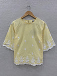 Yellow loop embroidered top